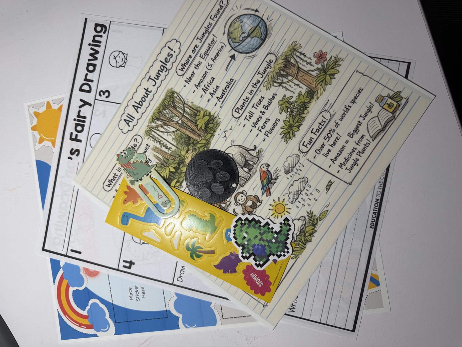 A Mailbox Wonders letter with a jungle fact sheet, activity page, and dinosaur stickers